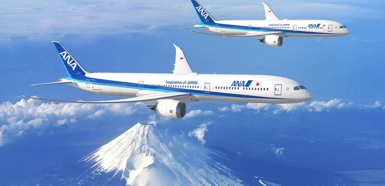 ana airplanes flying over mt fuji