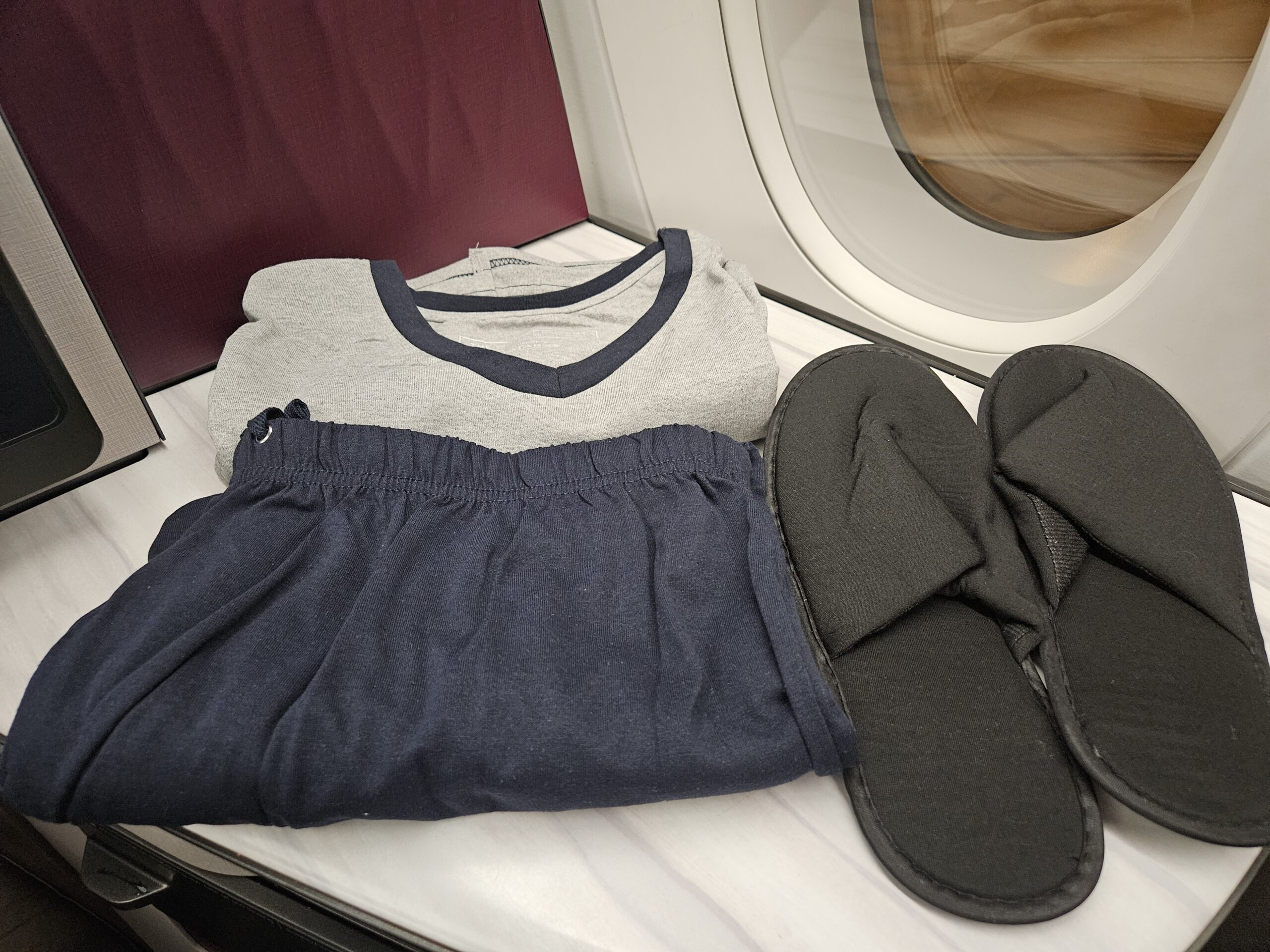 Qatar Airways A350-1000 Business Class Review: QSuite - pajamas and slippers