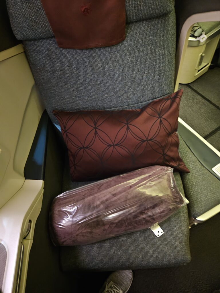 Qatar Airways 777-300ER Business Class Review – qatar airways 777 pillow and blanket.