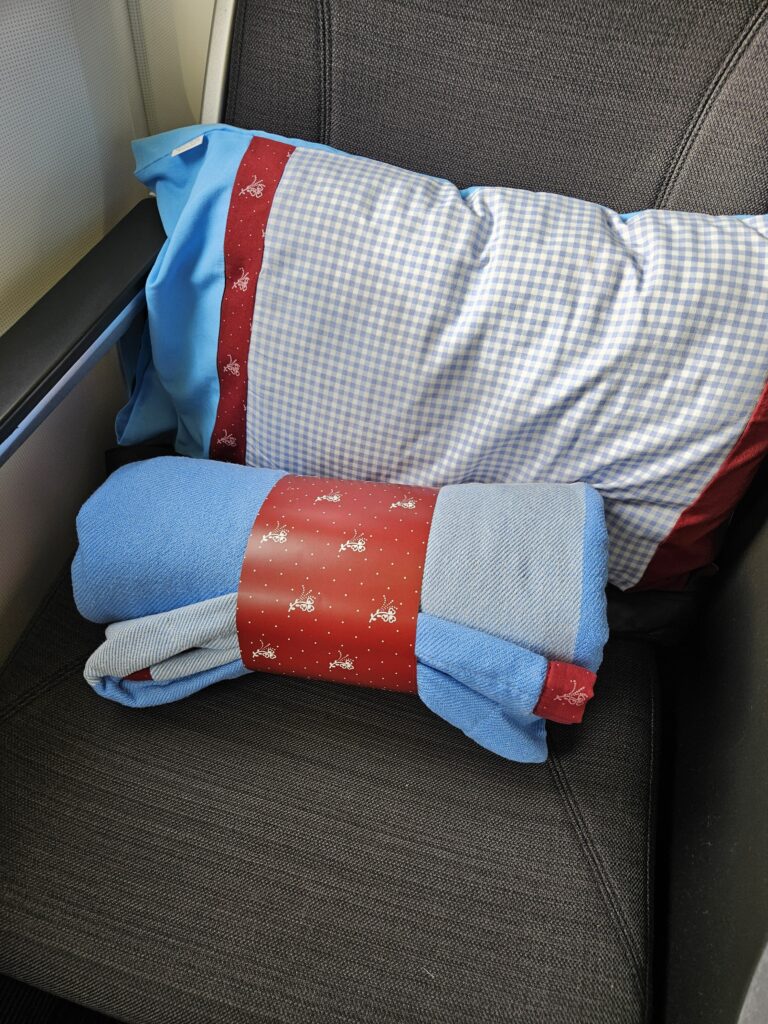 Austrian Airlines 767-300ER Business Class Review – austrian airlines business class pillow blanket covers bedding