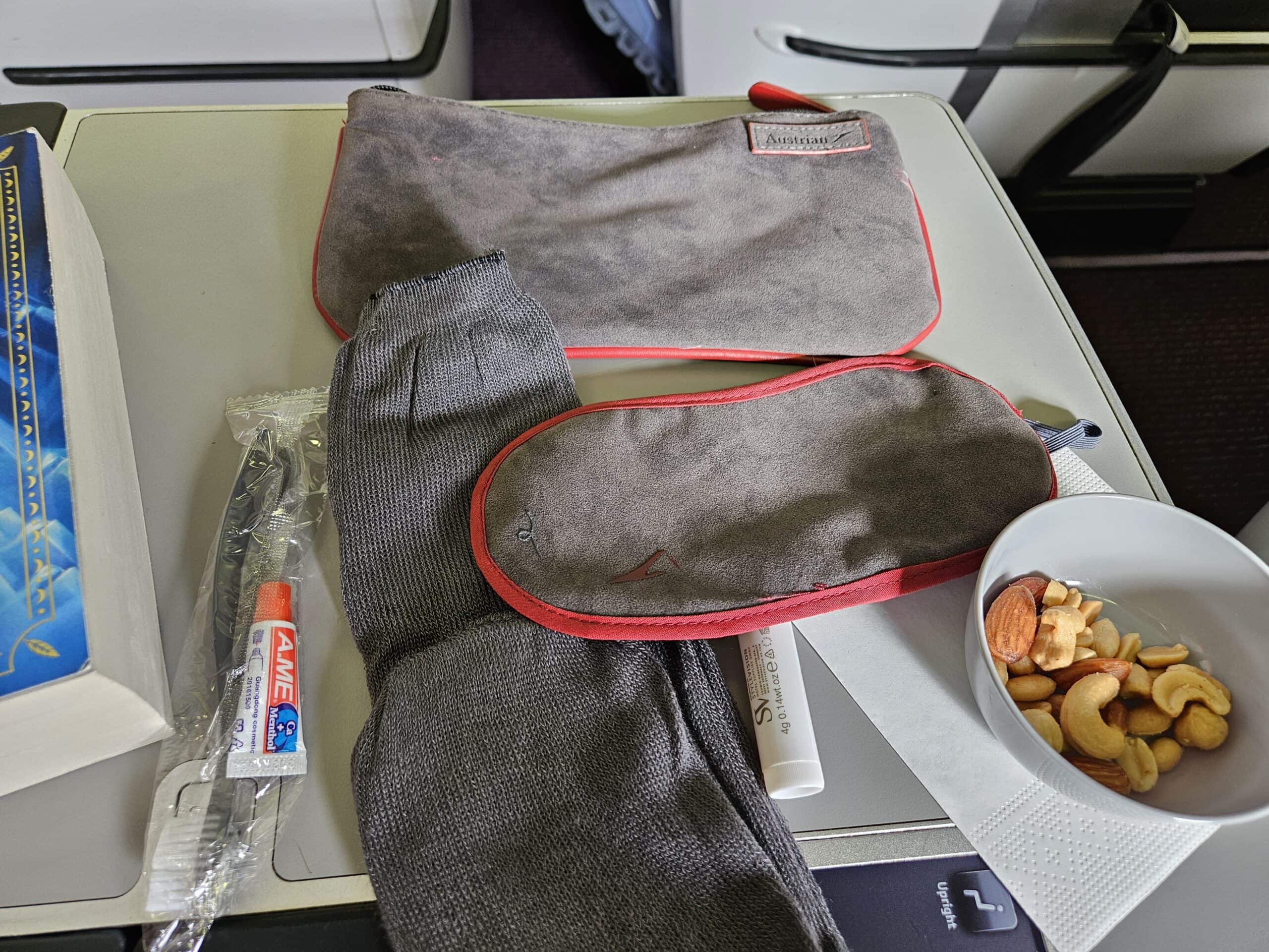 Austrian Airlines 767-300ER Business Class Review – amenity kit toothbrush toothpaste socks mask facemask business class austrian airlines