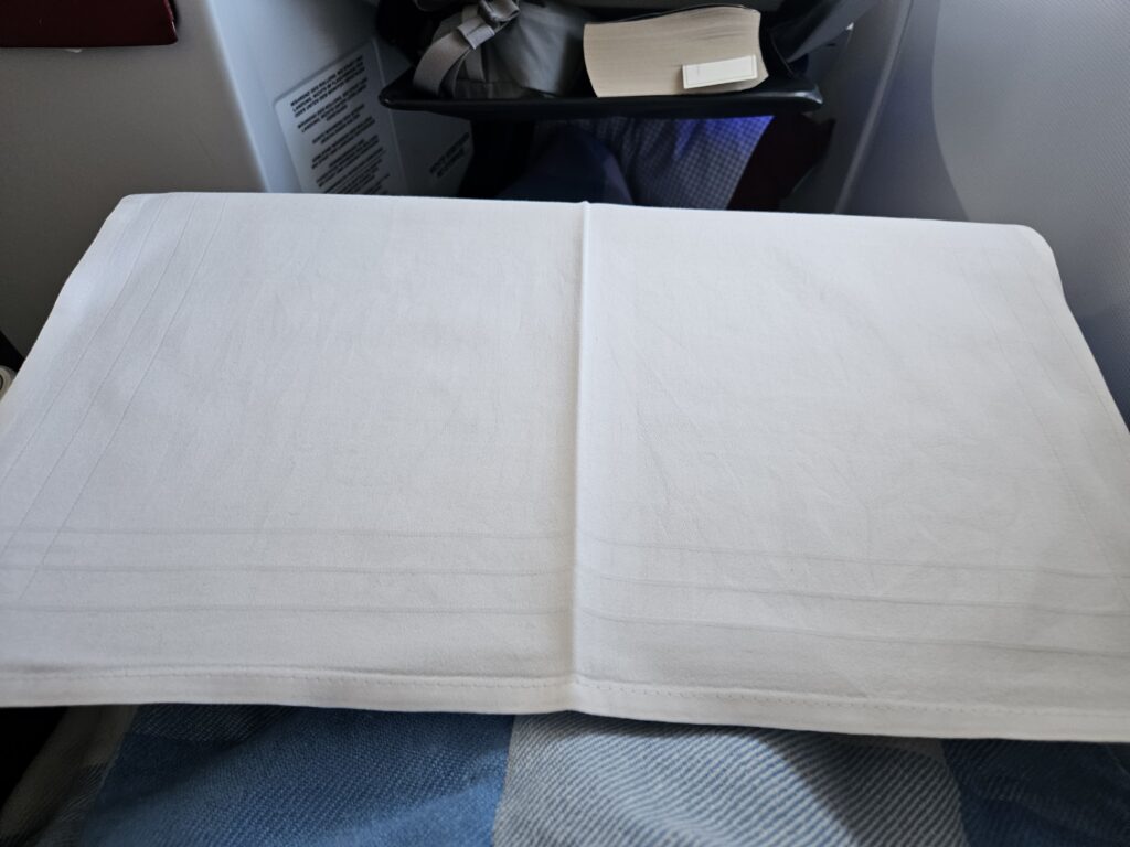 Austrian Airlines 767-300ER Business Class Review – tray table covered business class austrian airlines