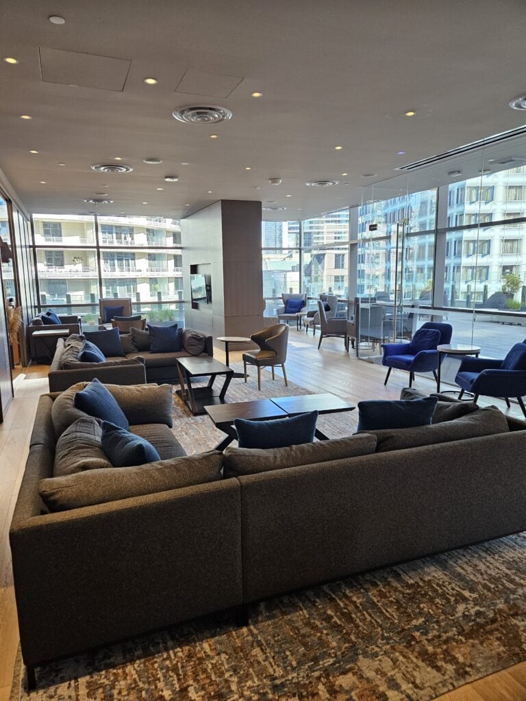 Hyatt Regency Seattle Review – couch couches chairs seating lounge hyatt regency seattle club