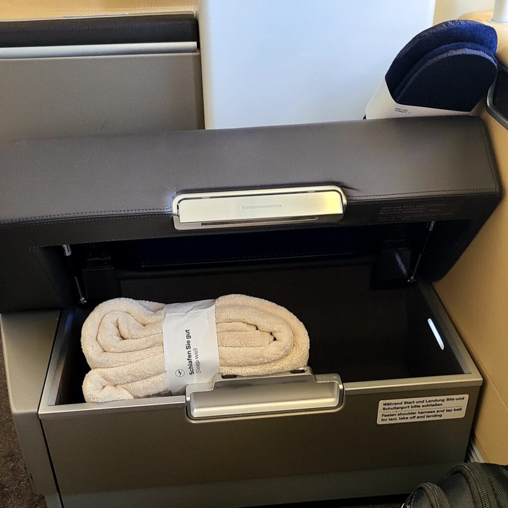 Lufthansa 747-8 First Class Review – Lufthansa First Class Seat Ottoman Storage