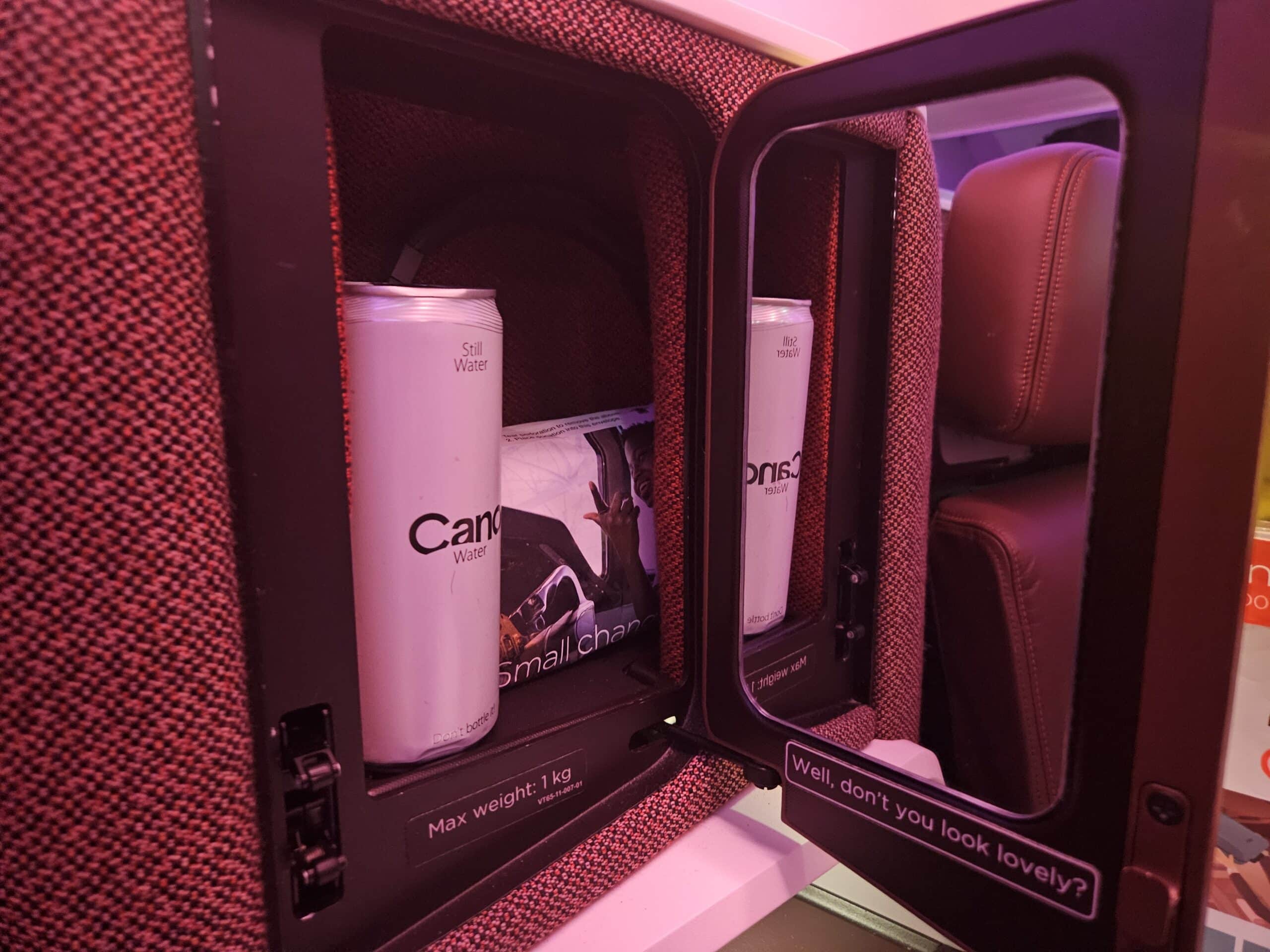 Virgin Atlantic A330-900neo Upper Class Review – virgin atlantic business class cabinet cubby water headphones mirror