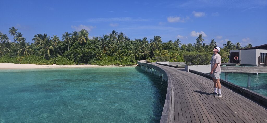 park hyatt maldives overwater sunset villa pool dock walkway to villa