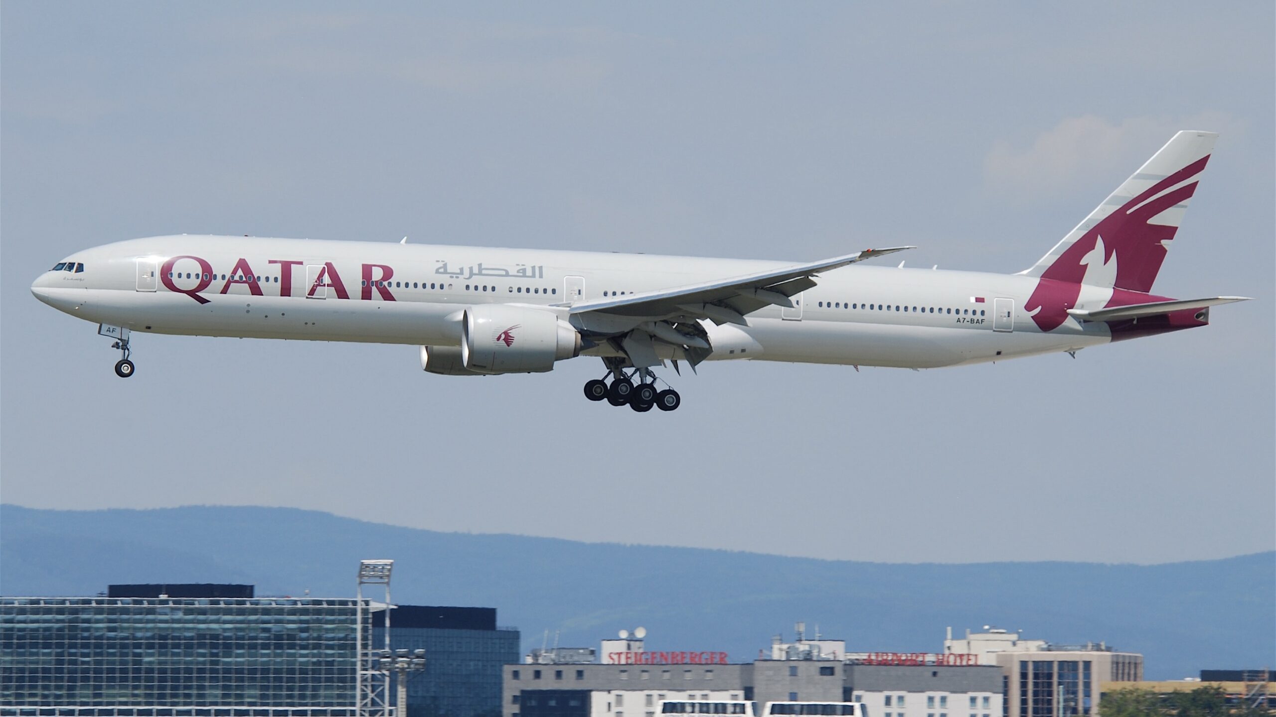 Featured image for “Qatar Airways 777-300ER Business Class [Qsuite]: A Complete Review”