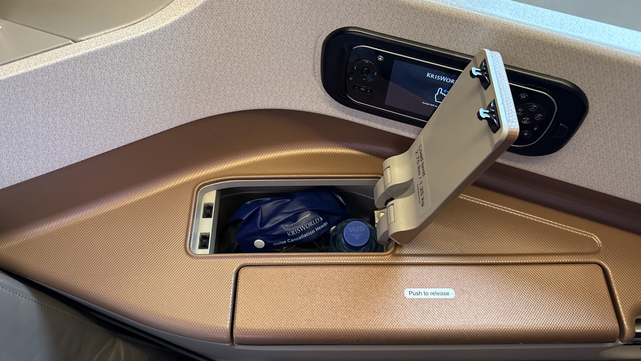 Singapore Airlines A350-900 Business Class TV Remote, Tray Table, And Headphones